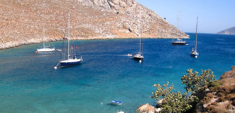 sailing boats anchored in Paleonissos, Kalymnos 