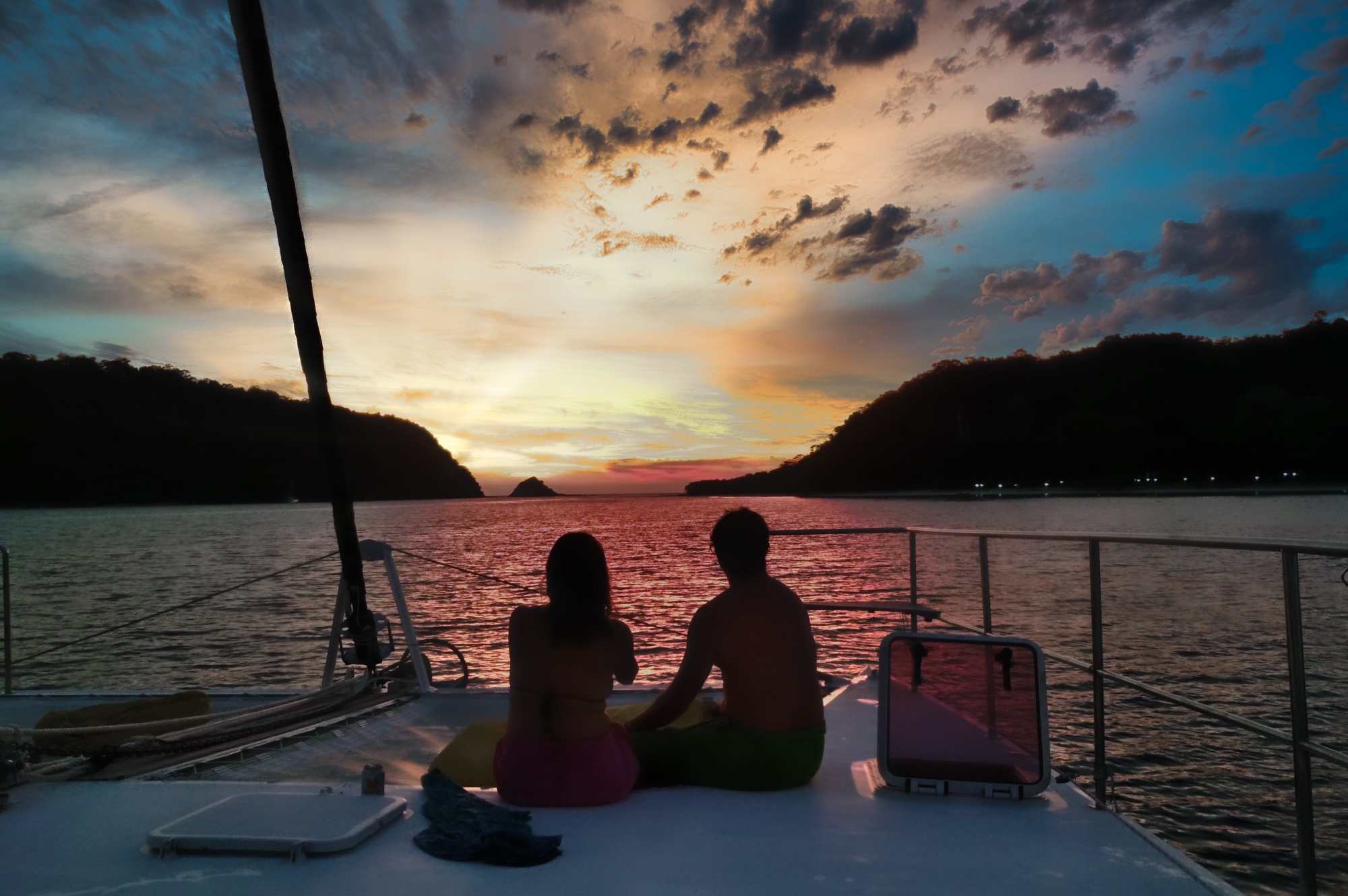 Mah couple on bow sunset