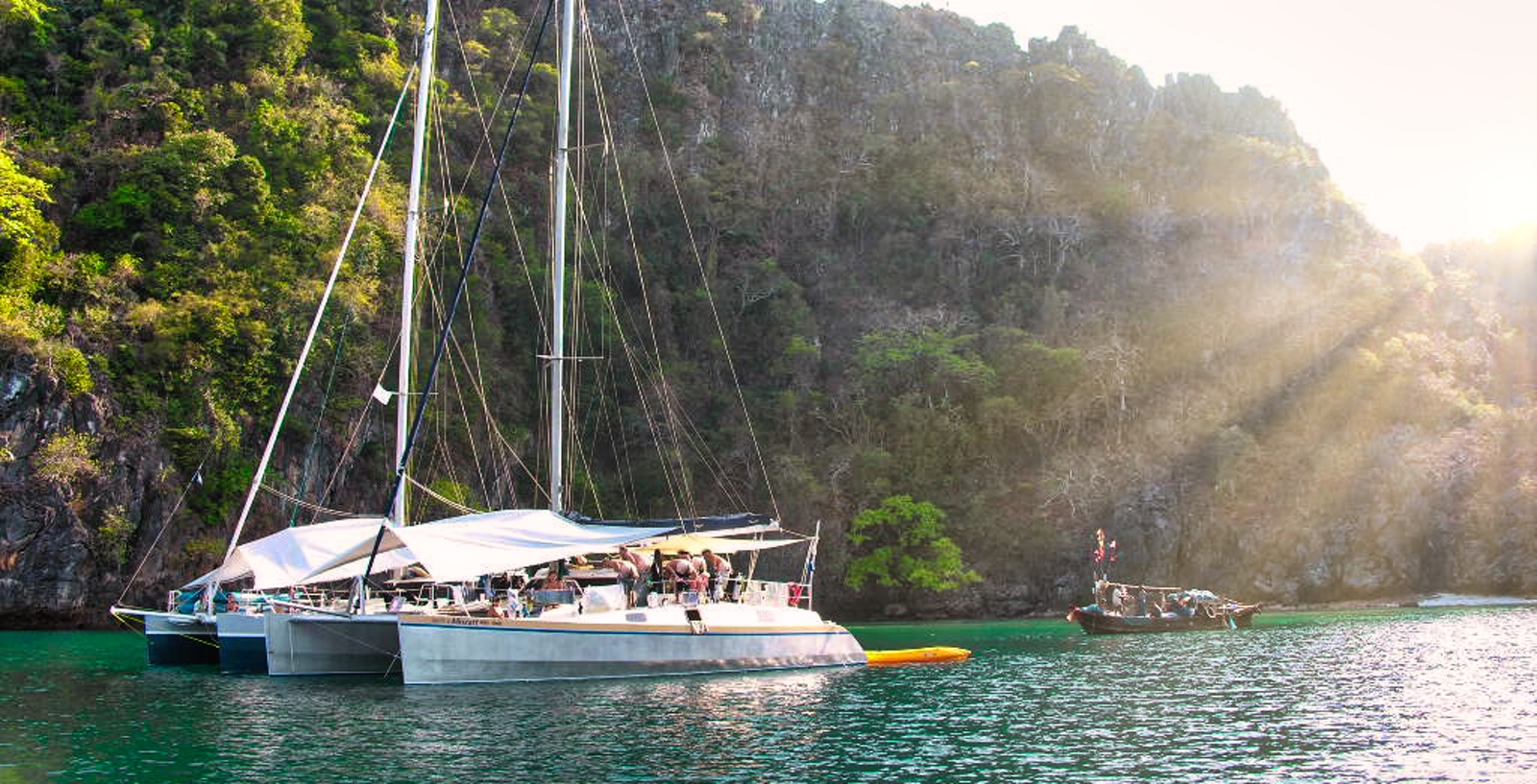 Sailing catamaran Mozart rafted up