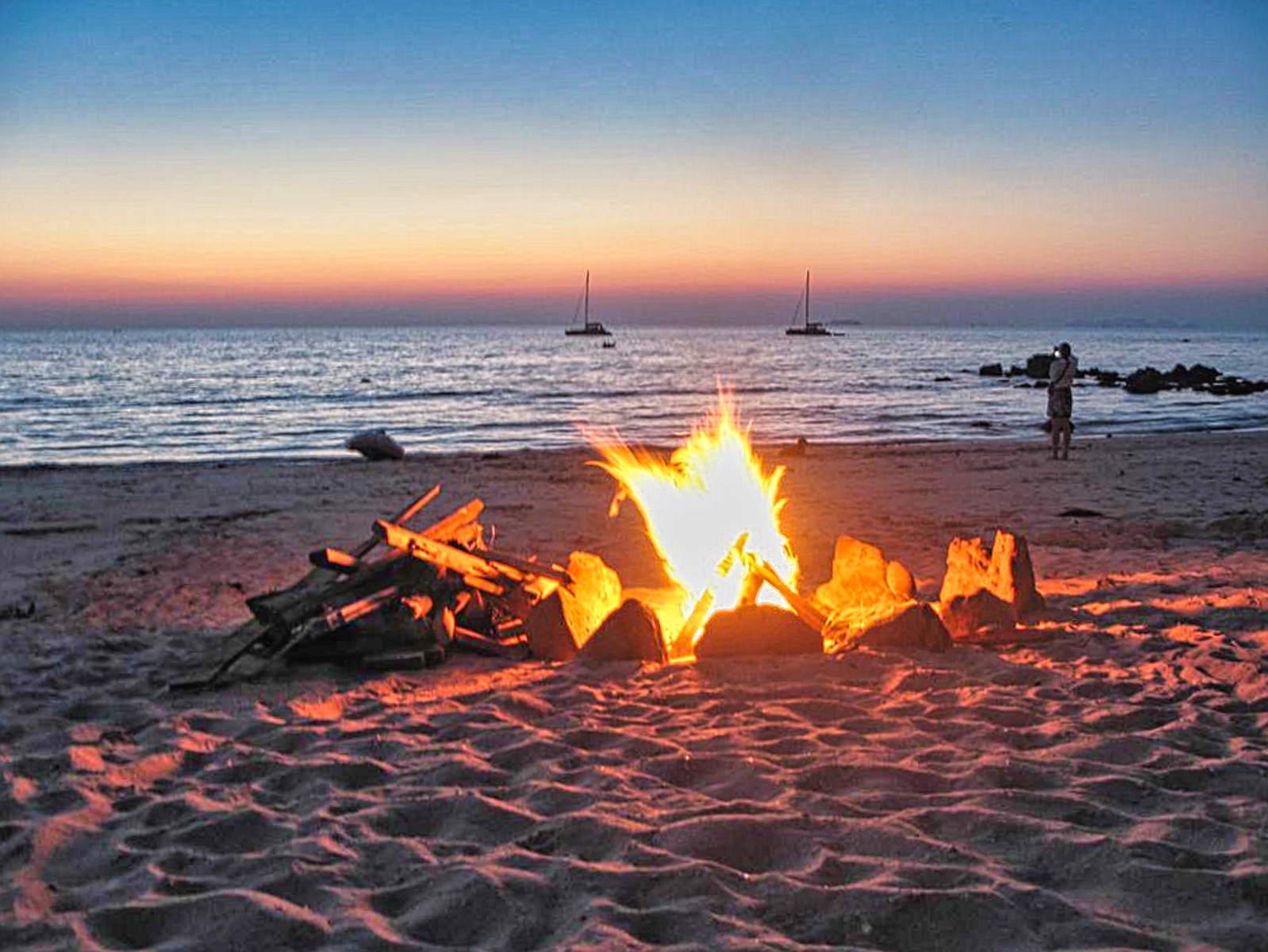 beach bonfire at dusk